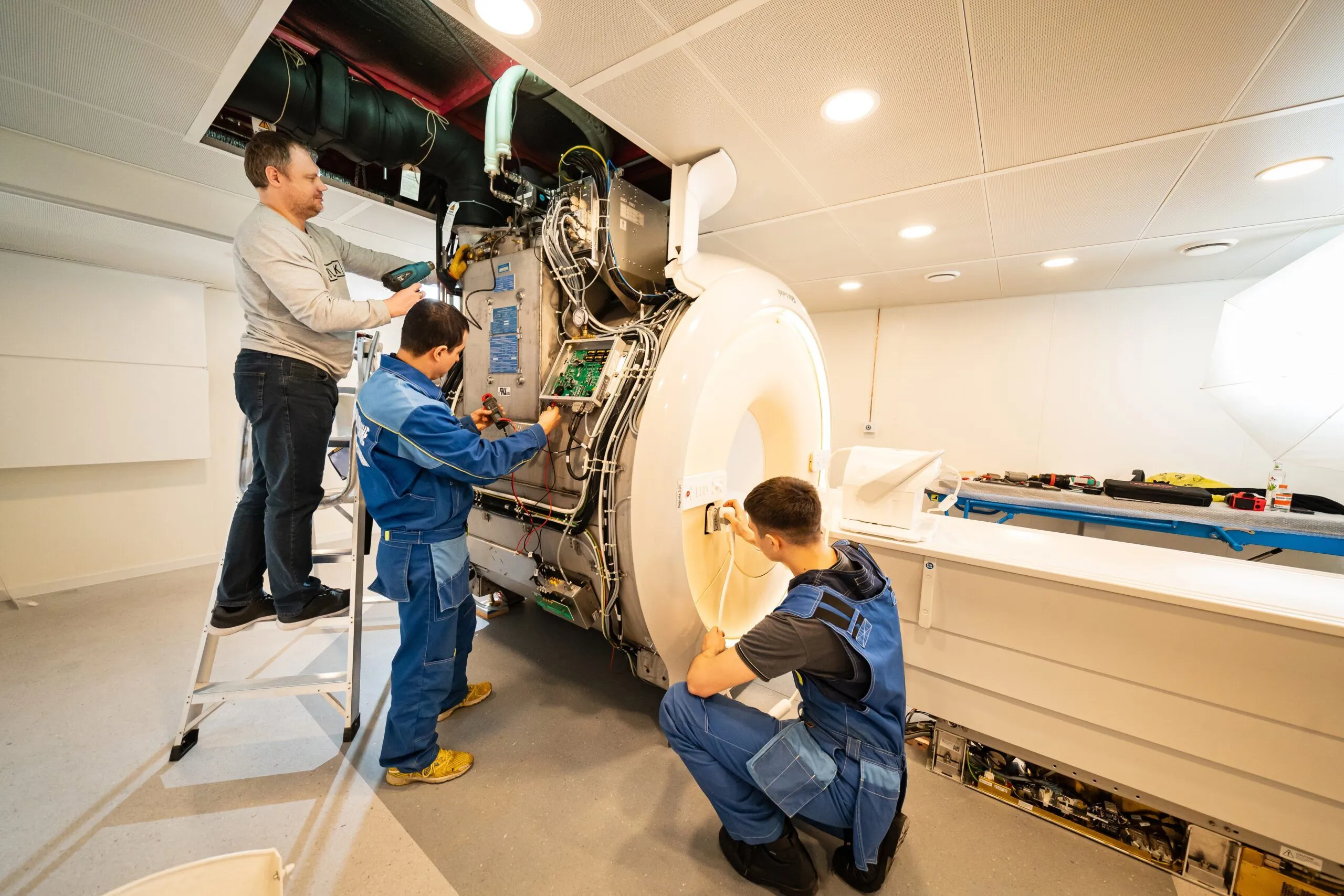 HTM Engineers on MRI Machine